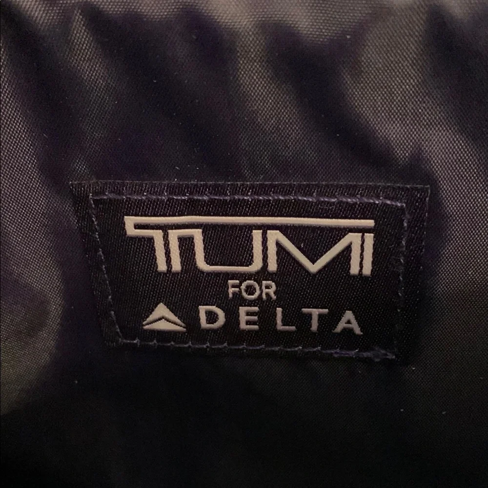 TUMI for Delta Black and Purple Travel Pouch